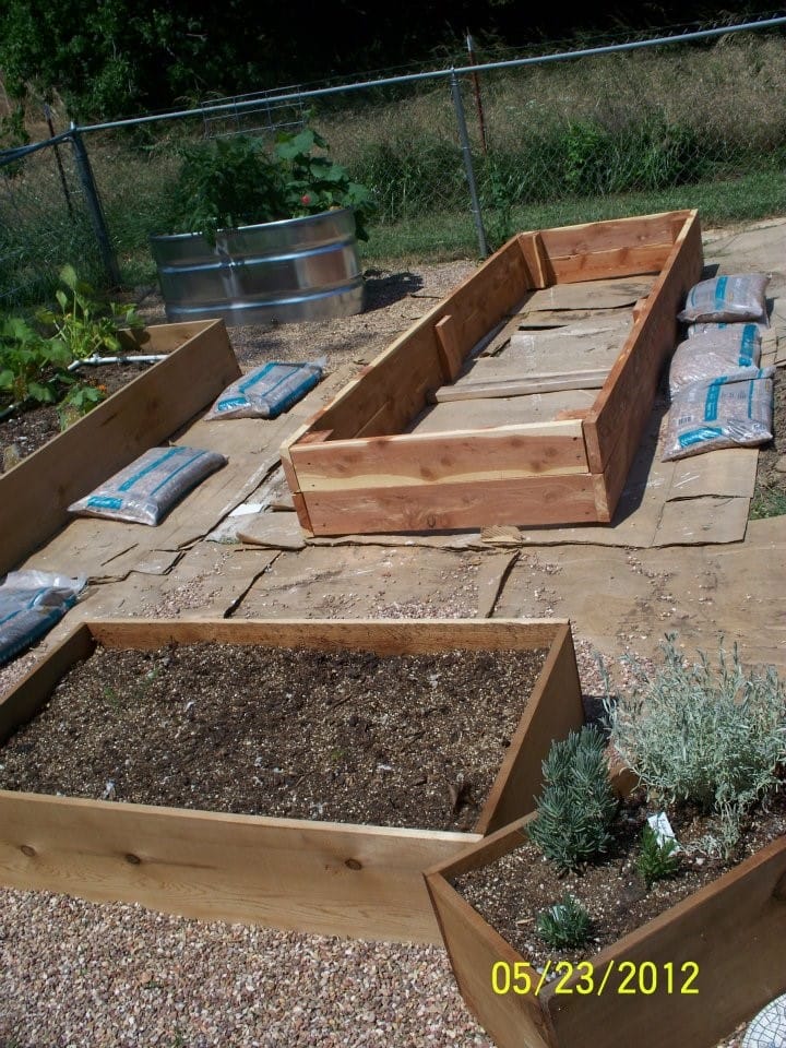 4 Steps to Start a Children's Garden in Your Daycare, several raised beds being built.