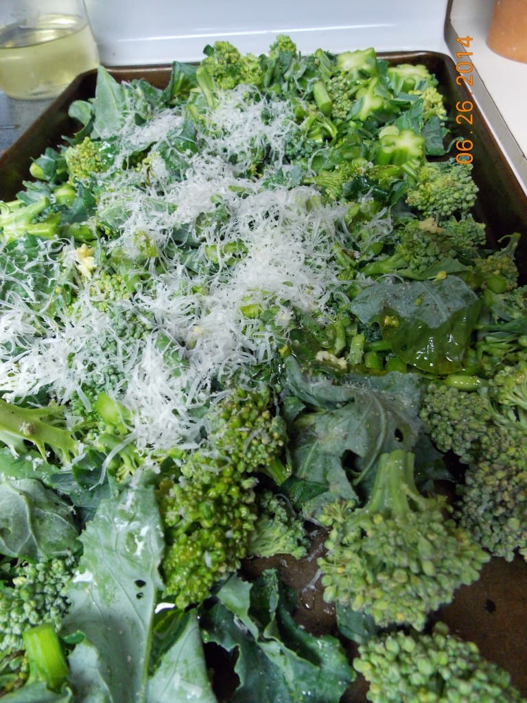 broccoli florets with shredded parmesan cheese on top