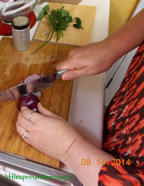 Cutting up pico de gallo ingredients