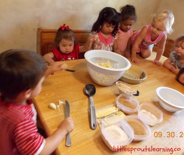 apple pie making at the table with kids