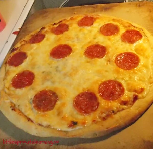 pepperoni pizza on a baking stone