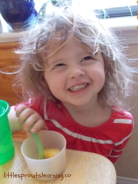child eating a bowl of our kid-friendly pumpkin pie recipe