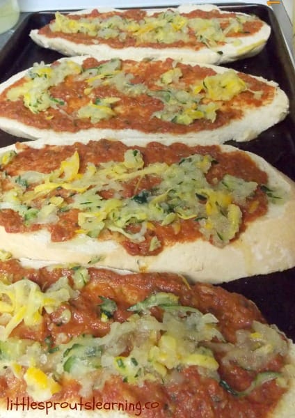 shredded summer squash on a pizza