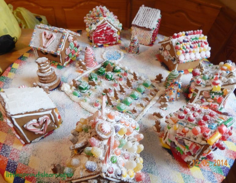completed gingerbread creation with snow gingerbread party with kids