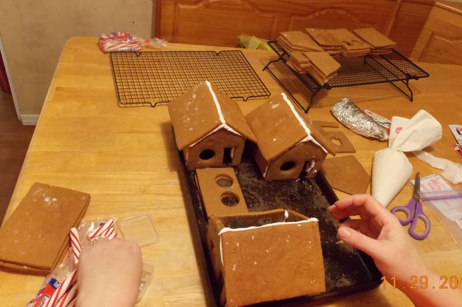 gingerbread building, gluing pieces together with royal icing
