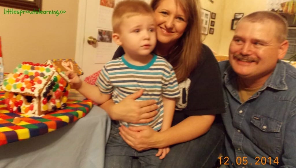 child and parents at daycare party