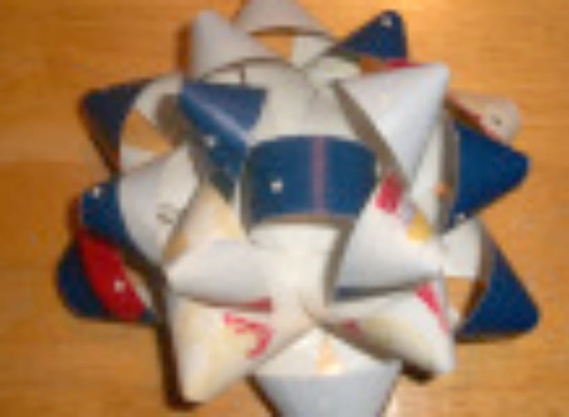 homemade package bows make with upcycled wrapping paper