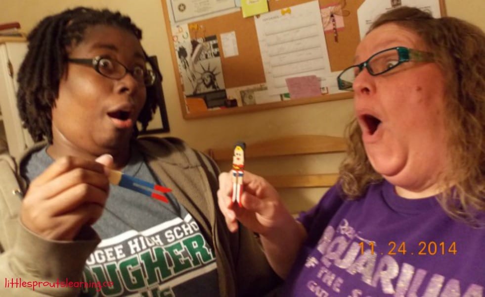 my good friend and I showing off our wonder woman Christmas decorations