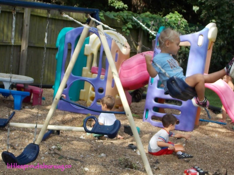 kids believing in themselves swinging on the playground