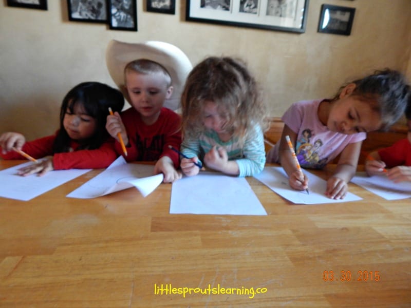 kids writing on paper