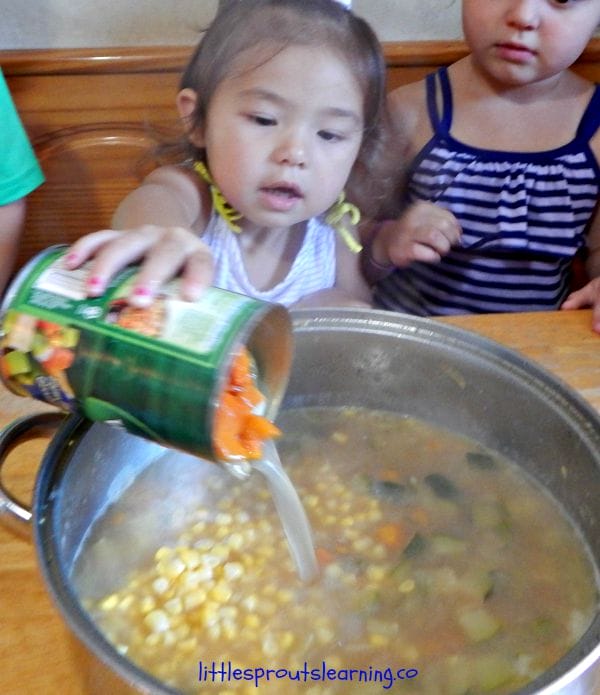 VEGETABLE BEEF SOUP RECIPE: Cooking with kids is a great activity. Vegetable beef soup is a big hit with the kids! Just use whatever vegetables you have a pound of ground beef to help the kids make a super tasty and healthy meal in the kitchen.
