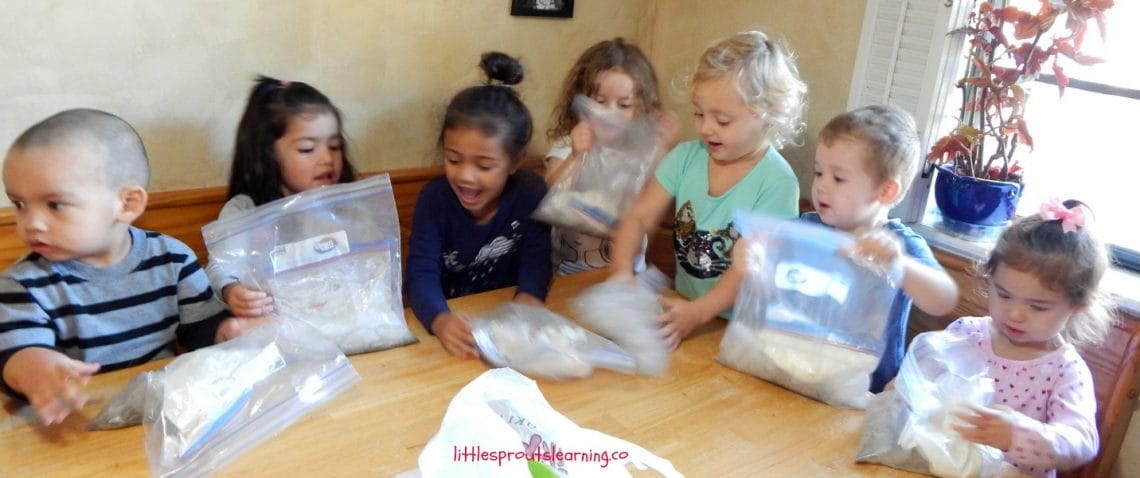 kids shaking ice cream in bags