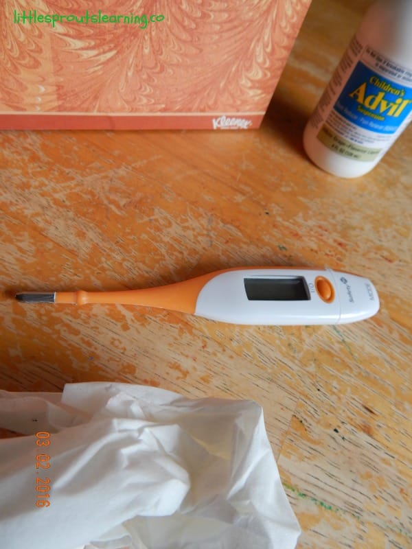 tissues, advil, thermometer and supplies for sick kids
