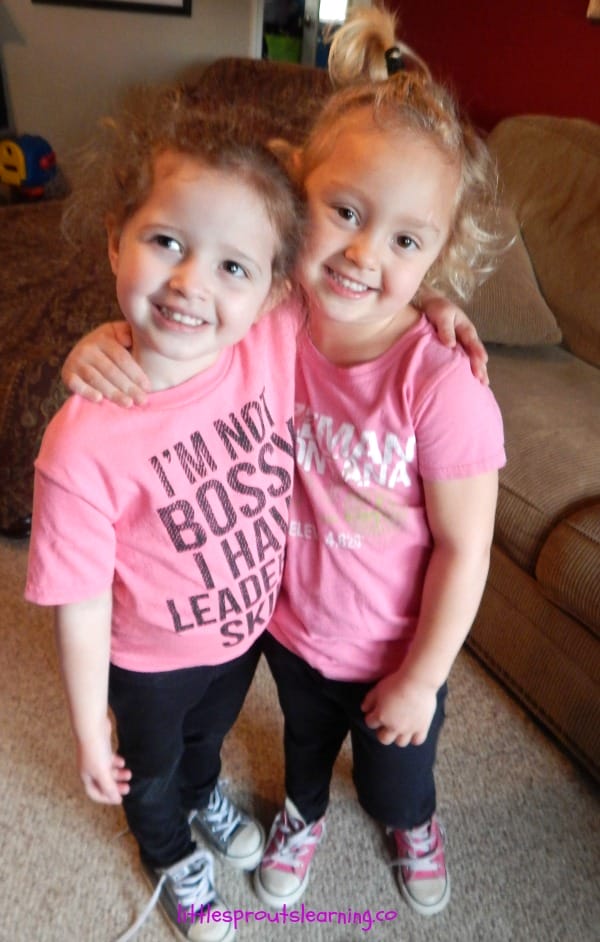 young friends with their arm around each other.