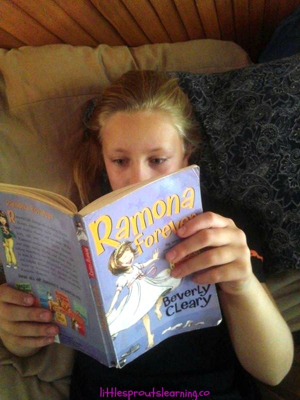 mia reading ramona forever by Beverly Cleary
