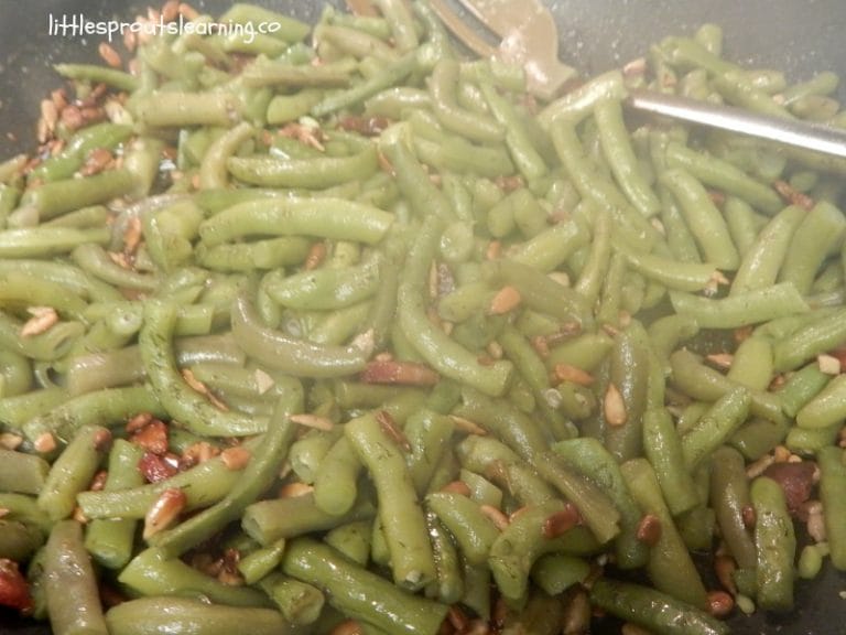 FRESH GREEN BEANS RECIPE: My daycare kids LOVE my world famous green beans. We had a ton of green beans coming out of the garden and were eating them as fast as we could. We came up with this super yummy fresh green beans recipe.