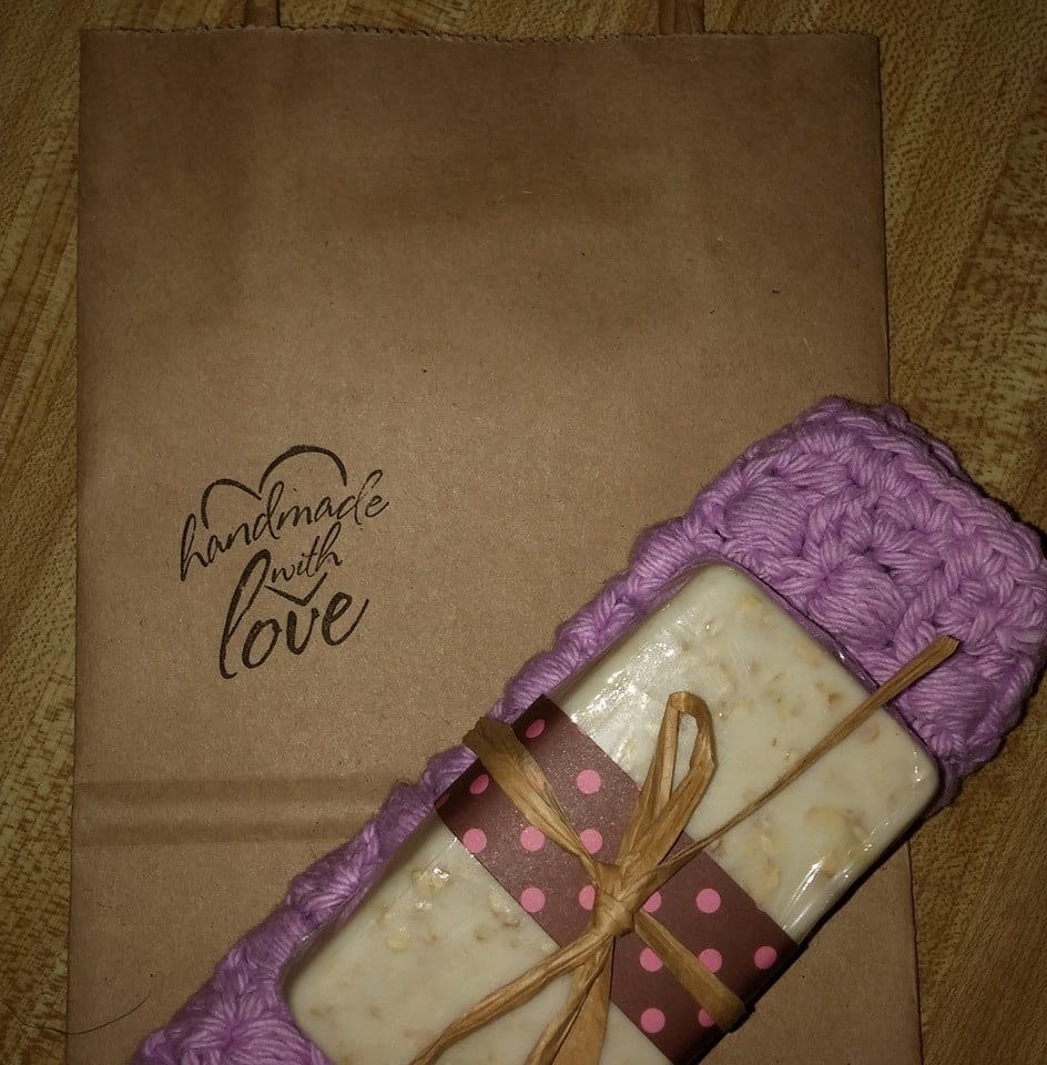 hand crocheted washcloth and handmade soap wrapped for gifting as a small handmade gift idea