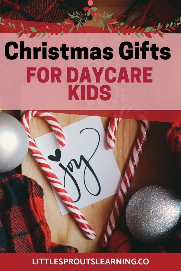 candy canes and christmas ornaments on a board with the word joy