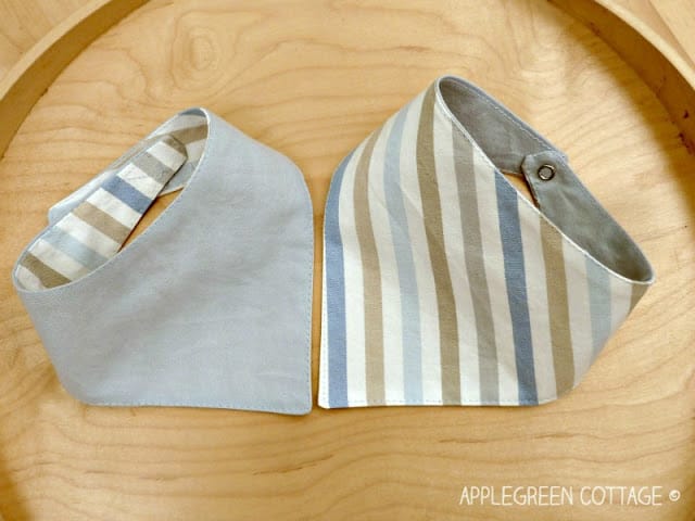 bandana bibs, hand sewn for gifts, on a tray