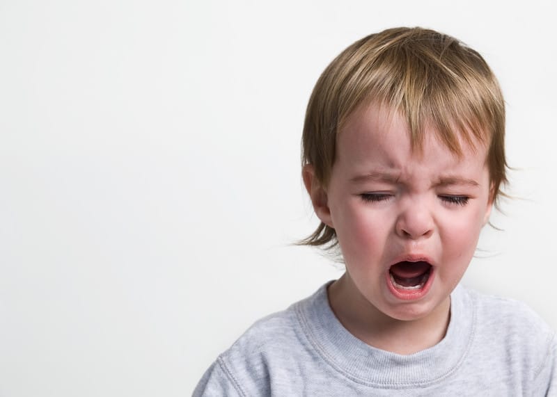 upset strong willed child crying
