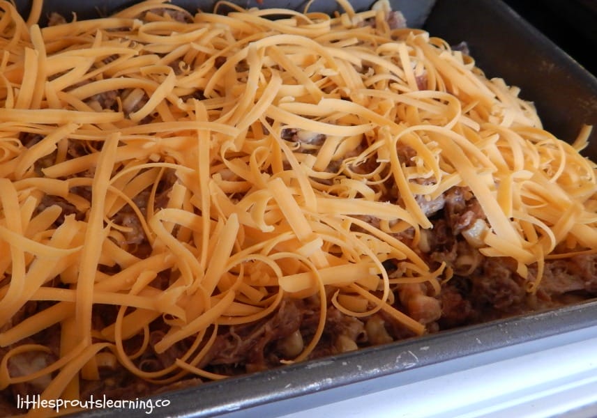 leftover pork roast recipe of enchiladas ready to go in the oven.