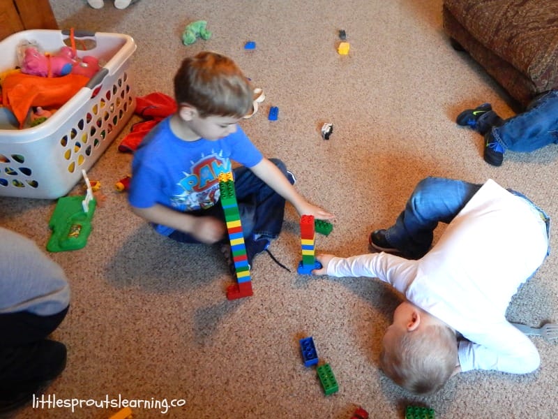 daycare kids sharing toys