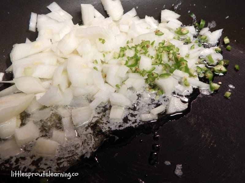 skillet with chopped onions and hot peppers
