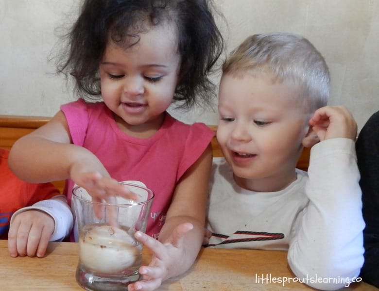 kids playing with "rubber" egg that has been soaked in vinegar