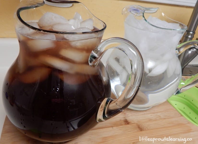 Pitcher of sweet tea and pitcher of ice water.