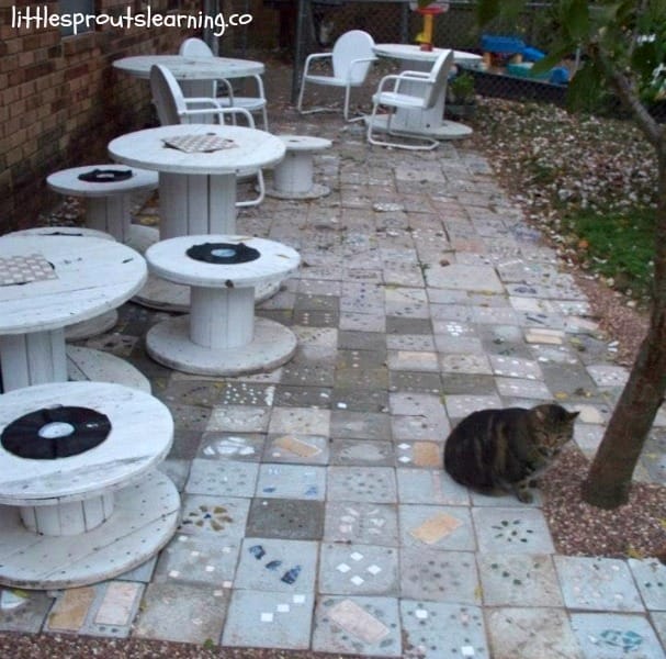 Would you love to have a unique and personal place to hang out in the yard? You can make your own unique homemade stepping stone patio. We handcrafted our patio, and we LOVE it! It’s a great place to gather.