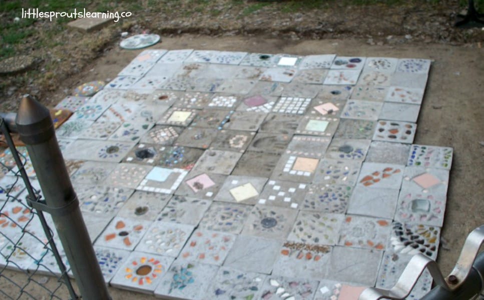 Placing te first 100 pavers in the patio template