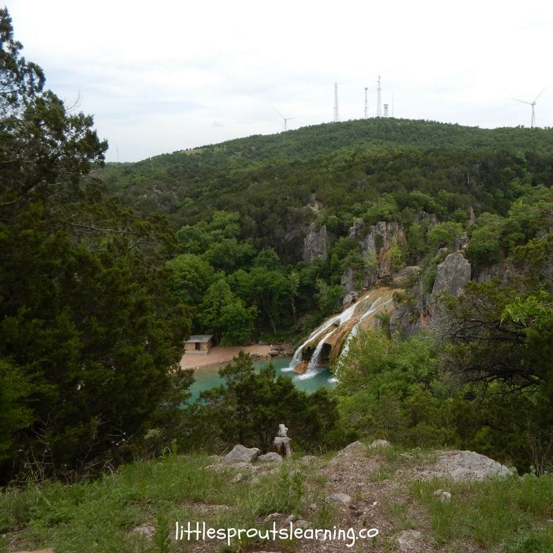 far off image of turner falls on an oklahoma road trip. Mountains and the waterfalls
