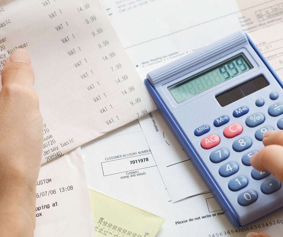 calculator, home daycare expense sheets, and recipts