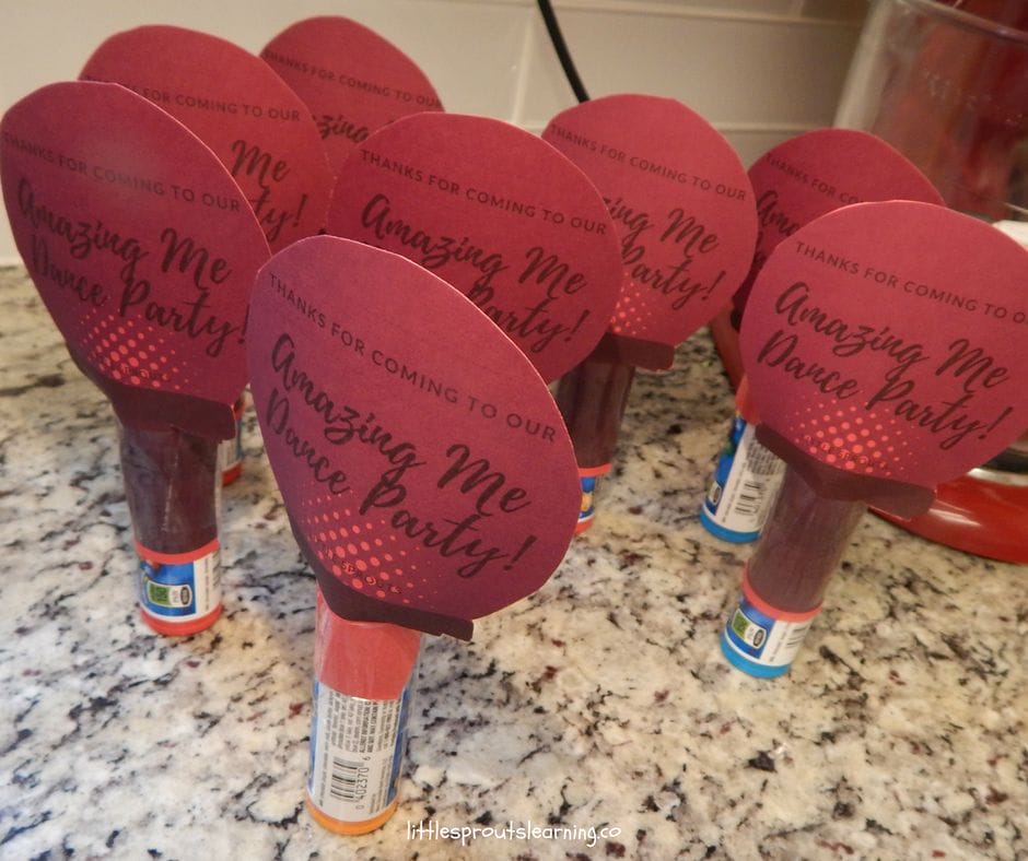 Homemade microphones for dance party with m and m minis and a paper topper