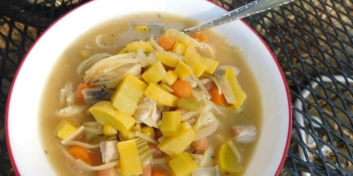 summer squash soup in a bowl on a table