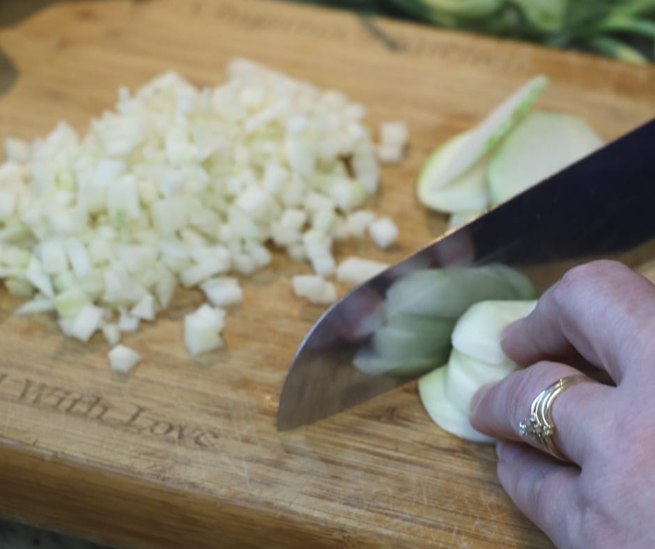 Dicing kohrabi on cutting board