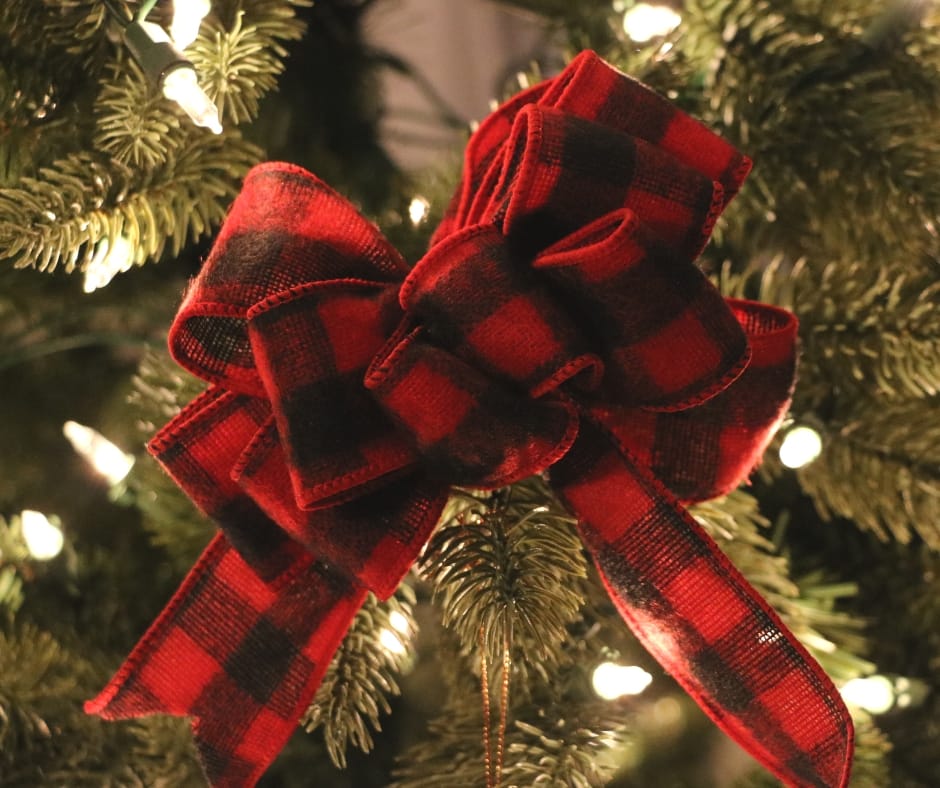close up of bow on a christmas tree, simple things to reduce christmas anxiety