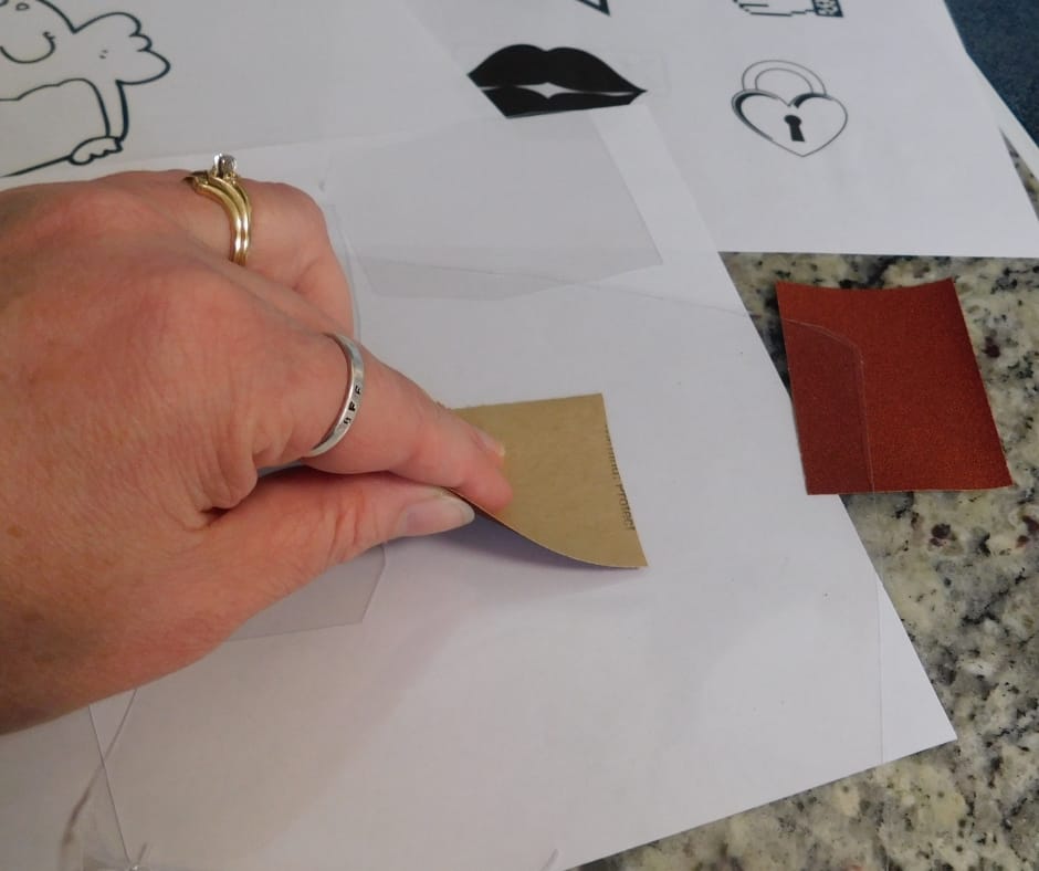 Sanding shrink art plastic.