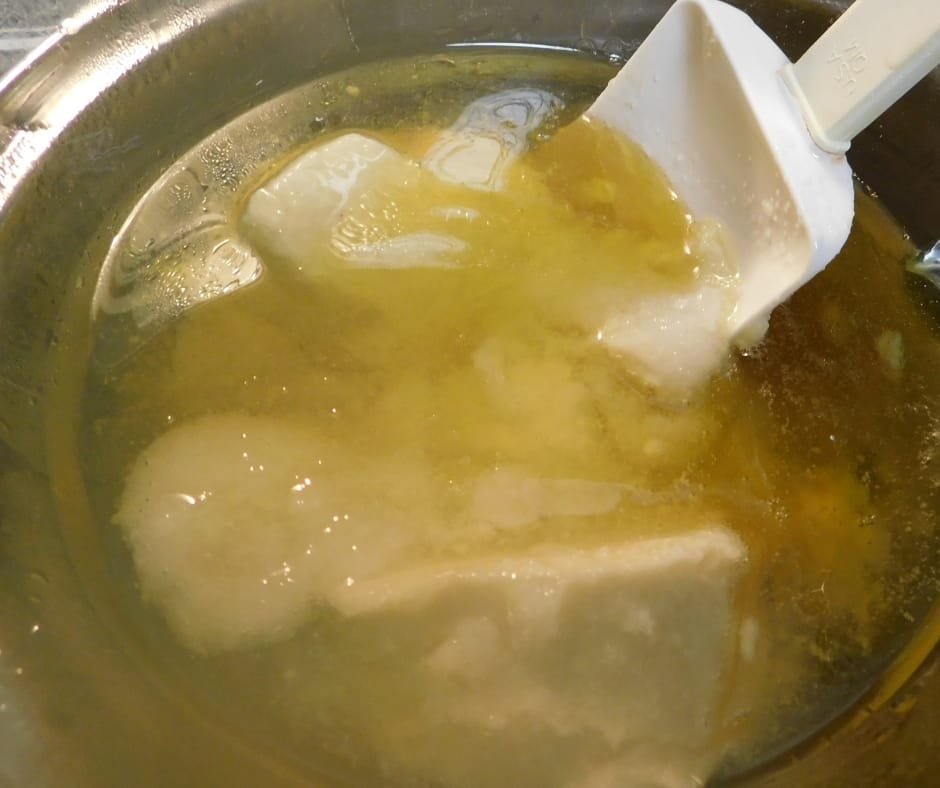 whipped body butter lotion over a double boiler