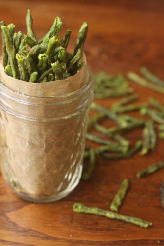 Green bean crisps in a small mason jar