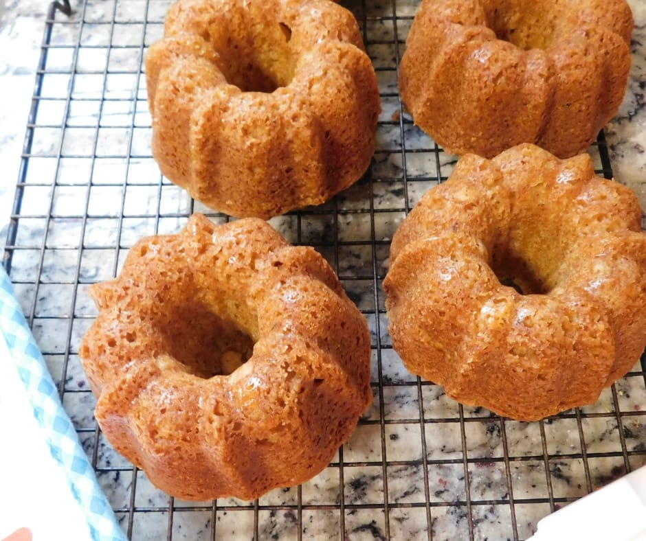 tiny bundt cakes on cooling rack