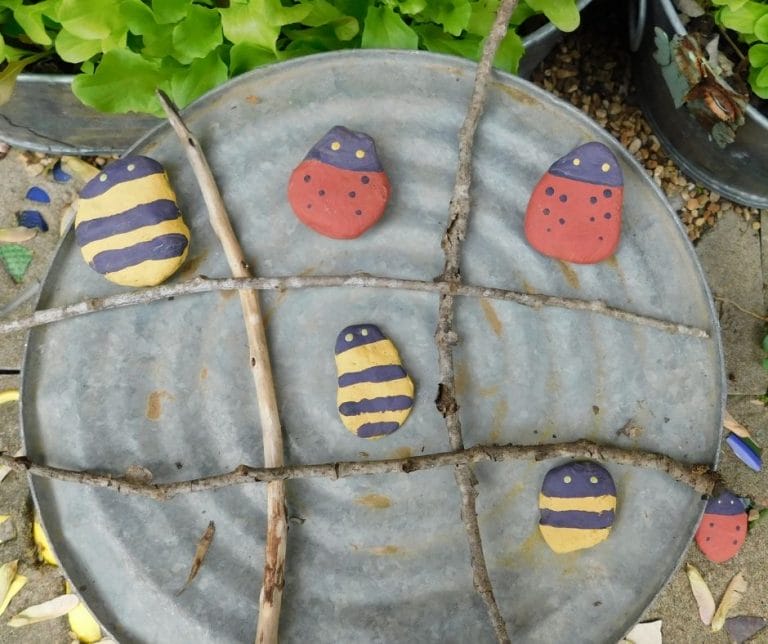 Looking to make the most of your summer? Check out this wooden tic tac toe game and other garden games you can make with what you have around the garden.