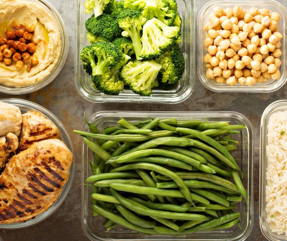 Meal prep containers with veggies, beans and more.