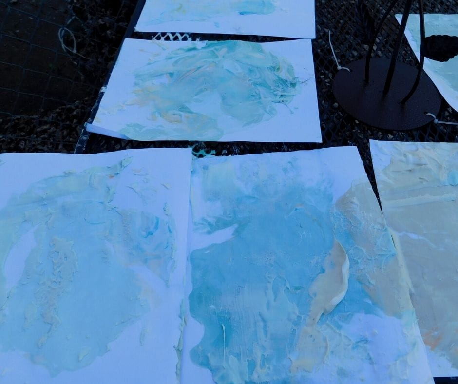 shaving cream paintings on a table