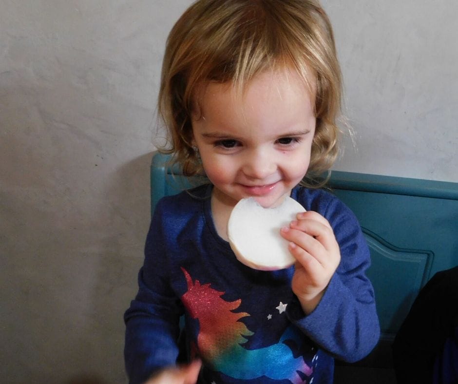 toddler trying a new food, jicima