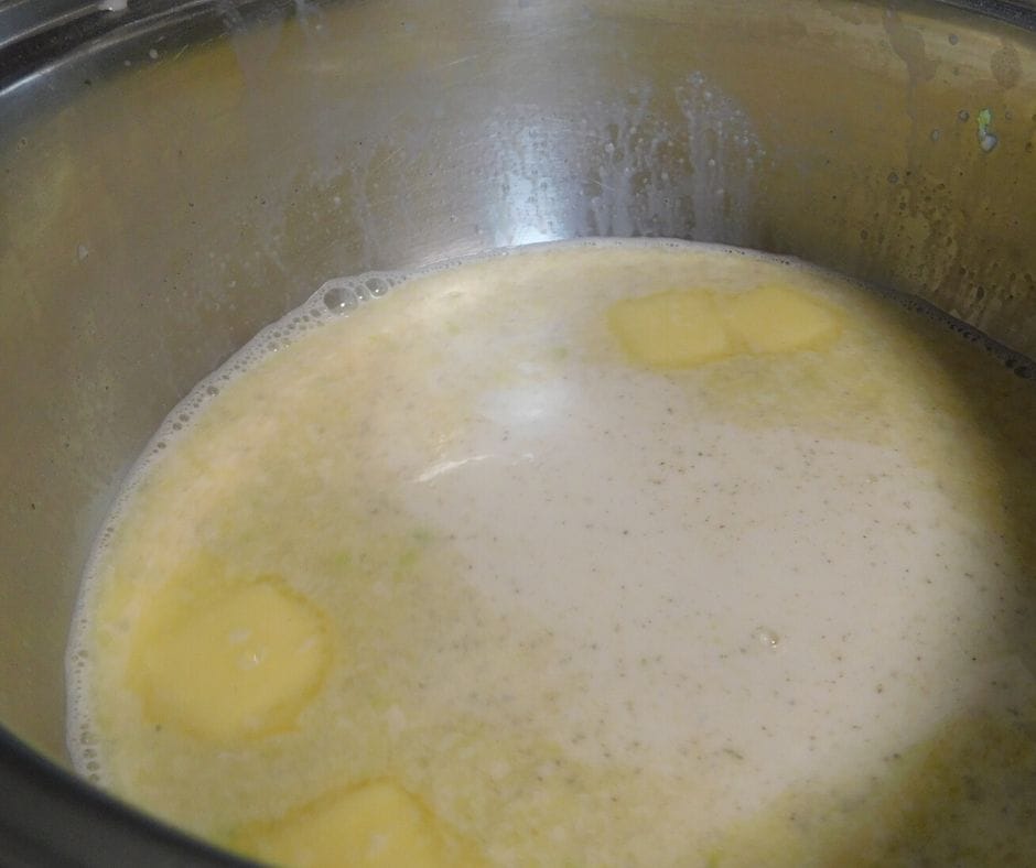 milk and butter cooking for mac and cheese sauce
