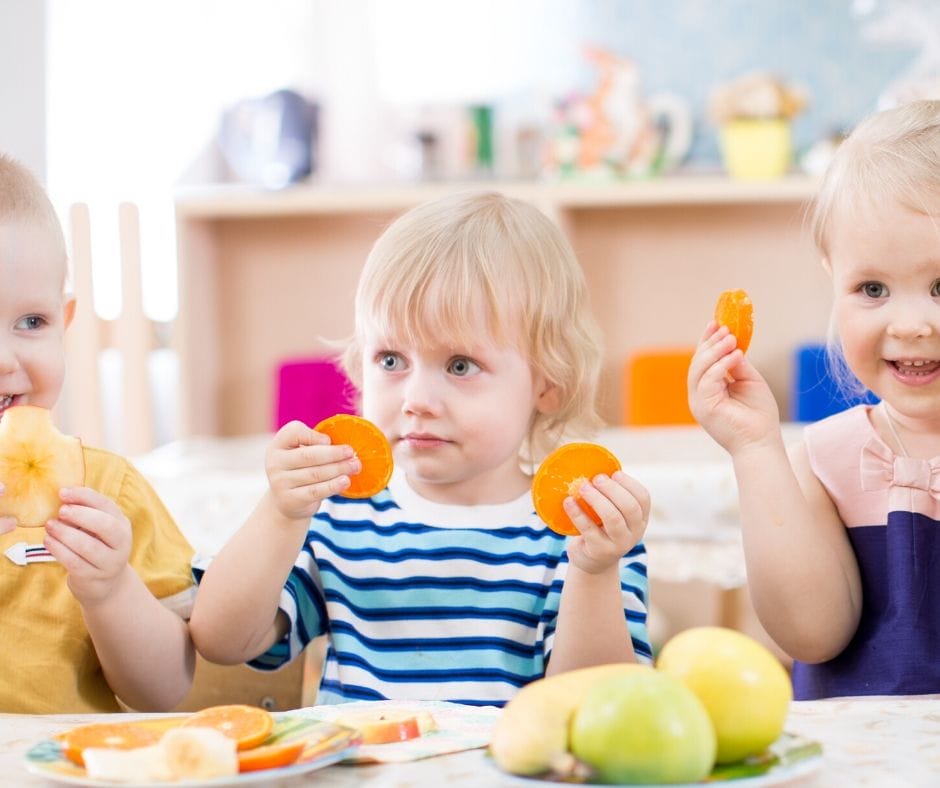 kids eating plates of food at daycare menu, oranges
