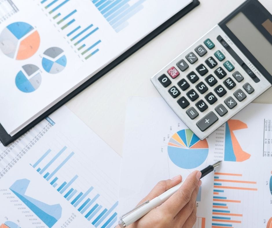 calculator and spreadsheets on a table