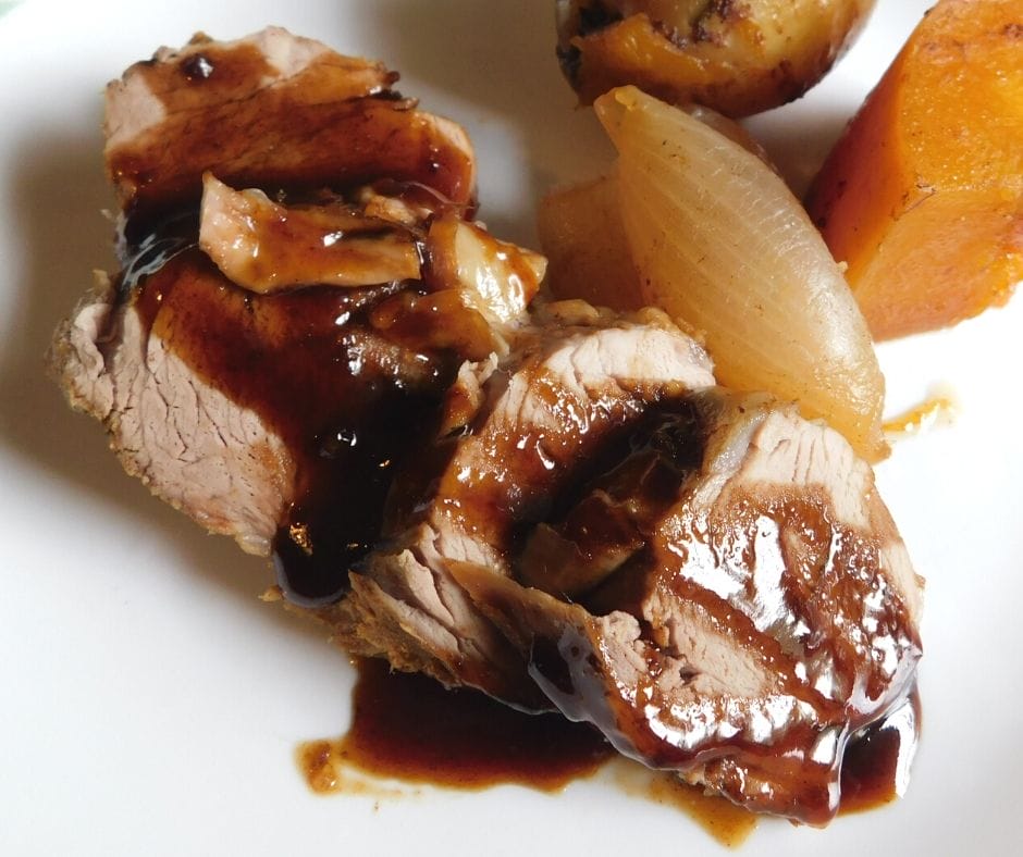pork tenderloin teriyaki with onion and potatoes.