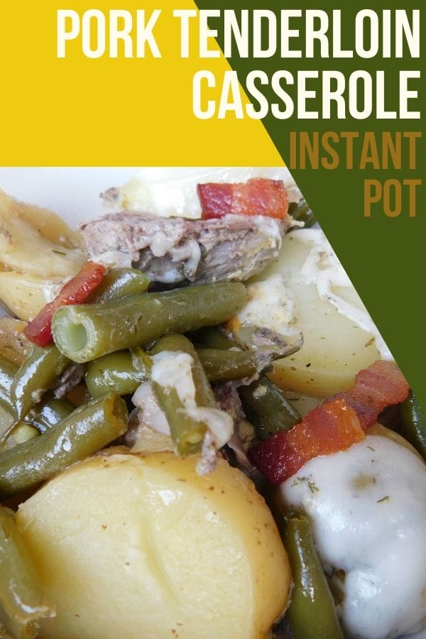 pork tenderloin casserole in a bowl with bacon, green beans, potatoes and cheese